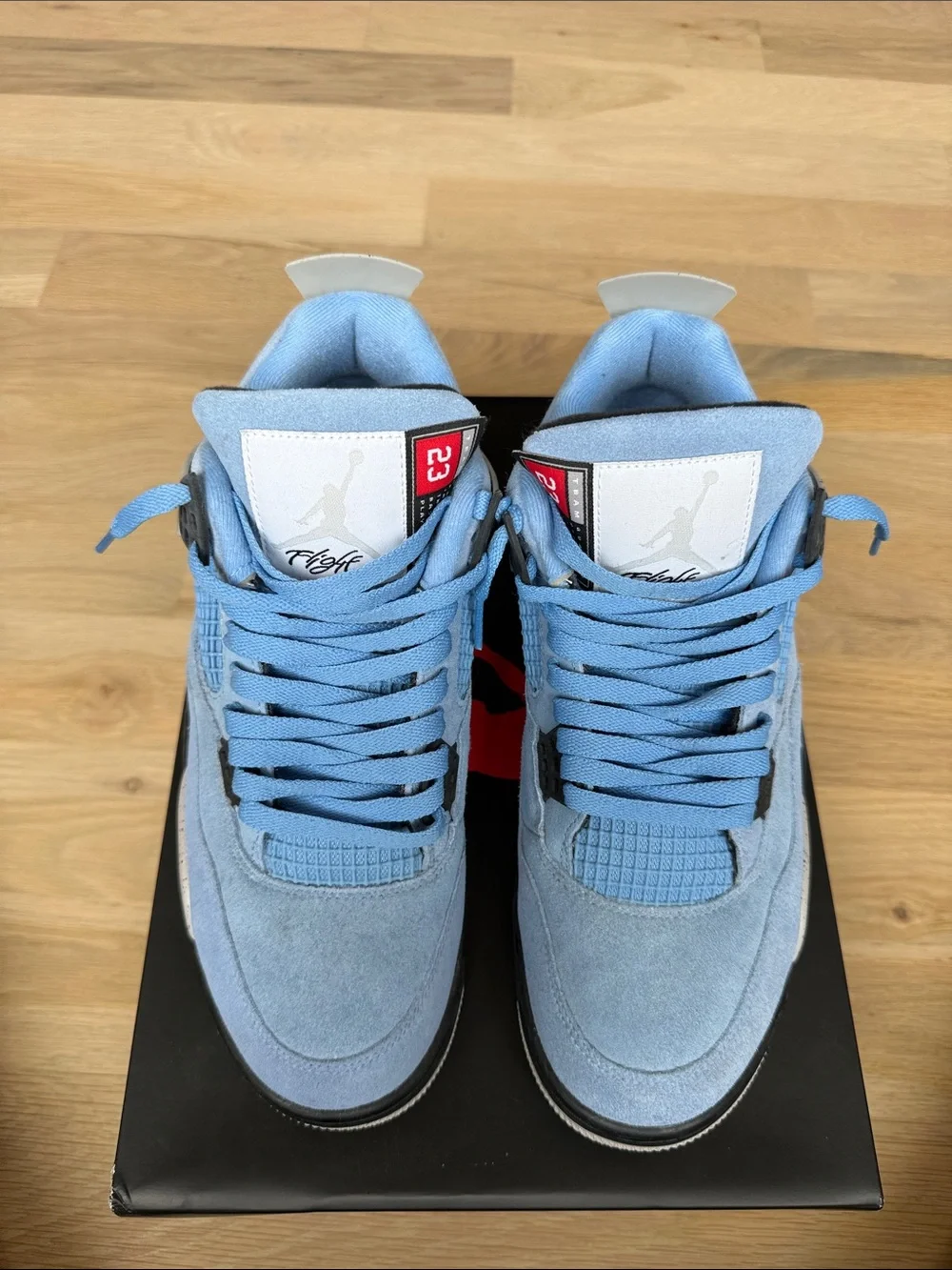 Retro Jordan 4s University Blue